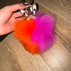 MCM rabbit pink/orange fur ball bag or key charm